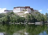 Tibet Lhasa 03 04 Potala From Behind, Above the Dragon King Pool The time on our entrance ticket wasnt for over an hour, so we walked the Potala kora, with a spectacular view of the Potala Palace from behind, above the Dragon King Pool.